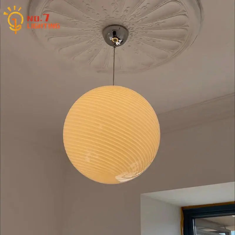 Ribbed amber glass pendant light for dining room