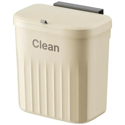 Ribbed cream and gray kitchen cabinet hanging trash