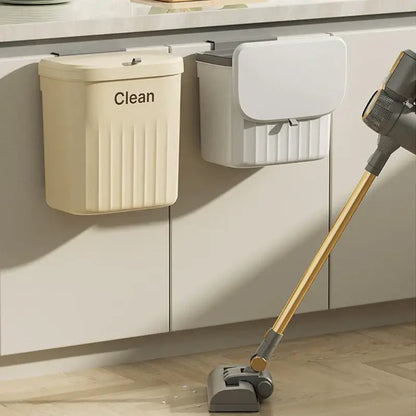 Ribbed cream and gray kitchen cabinet hanging trash