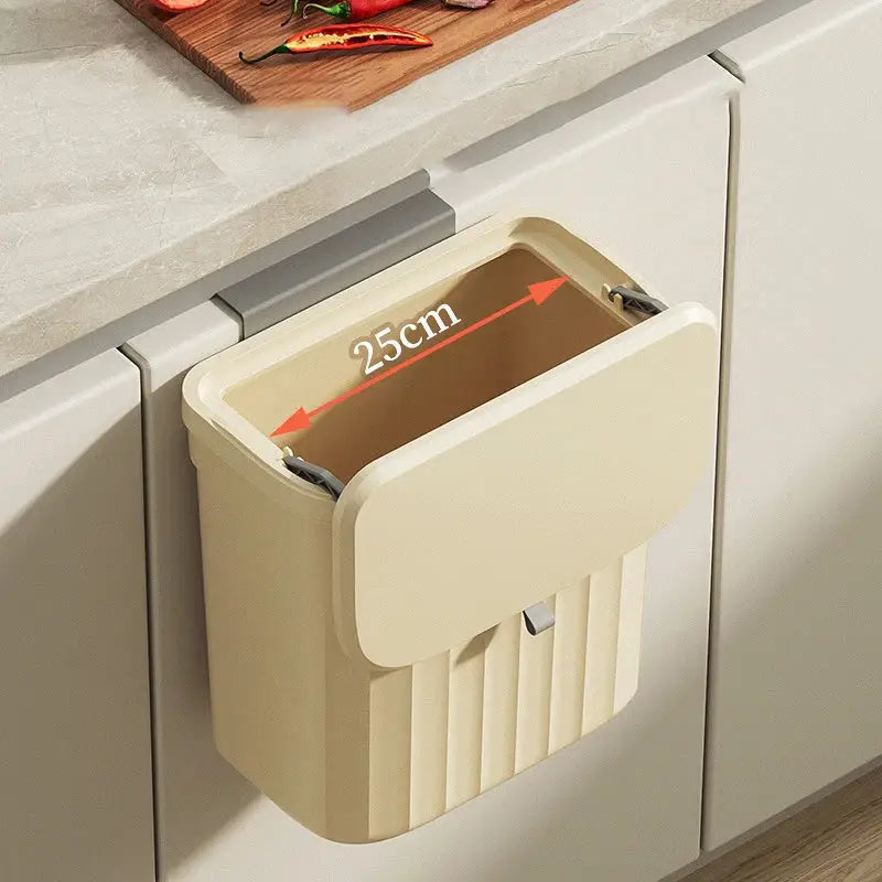 Ribbed cream and gray kitchen cabinet hanging trash