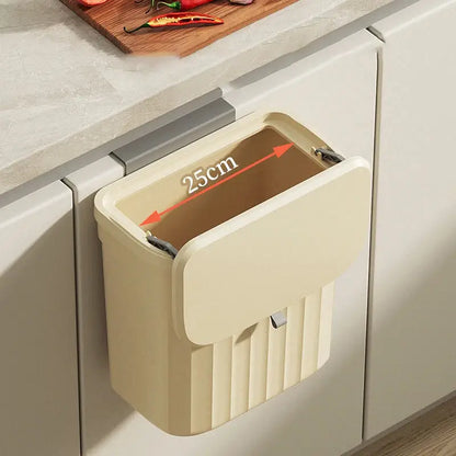 Ribbed cream and gray kitchen cabinet hanging trash