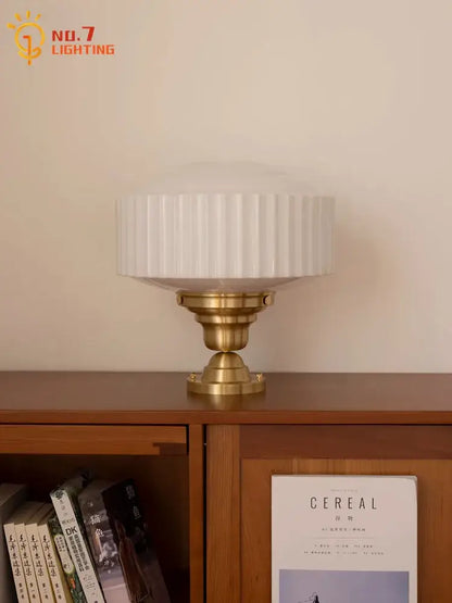 Ribbed cream glass and brass pendant light for dining room