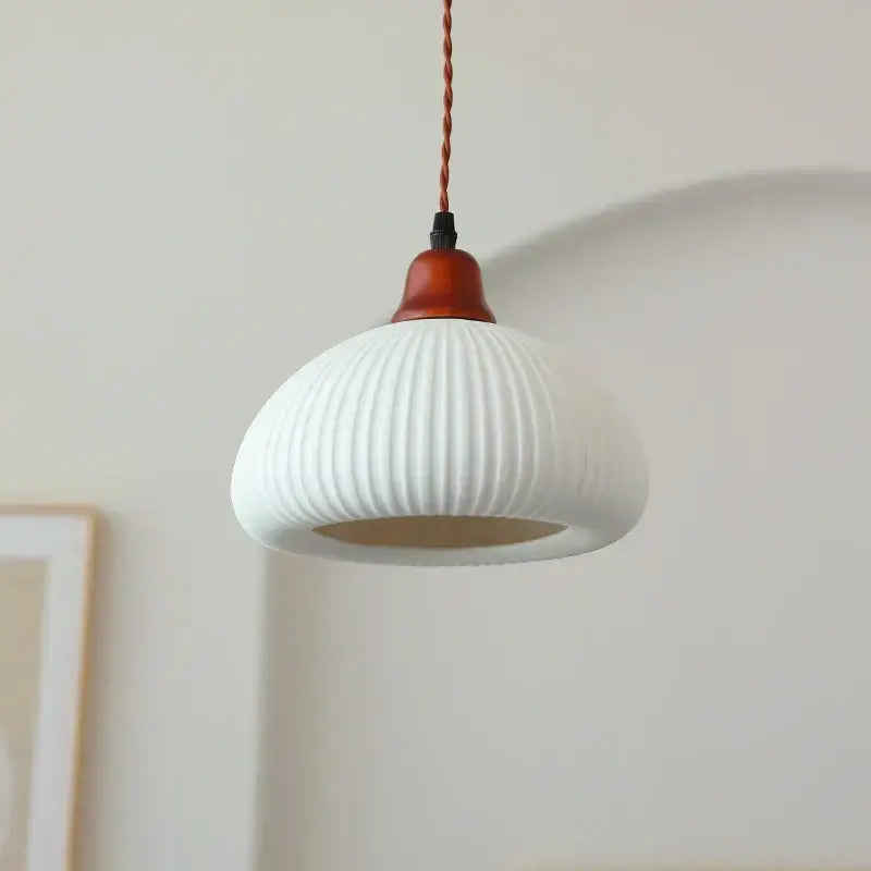 Ribbed cream glass pendant light with wood top for dining room