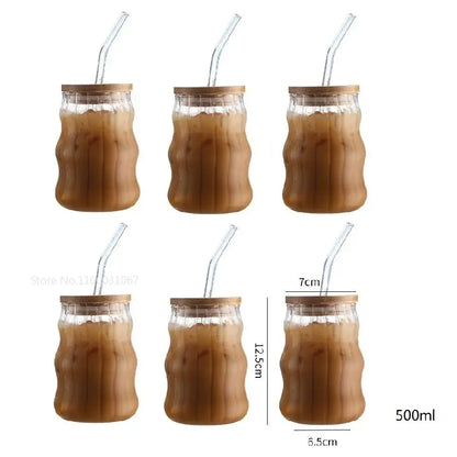 Ribbed glass cup set with bamboo lids and straws for dining room
