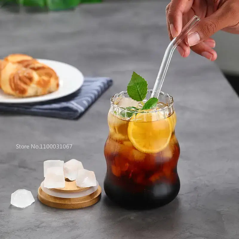 Ribbed glass cup set with bamboo lids and straws for dining room
