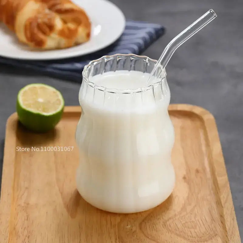 Ribbed glass cup set with bamboo lids and straws for dining room