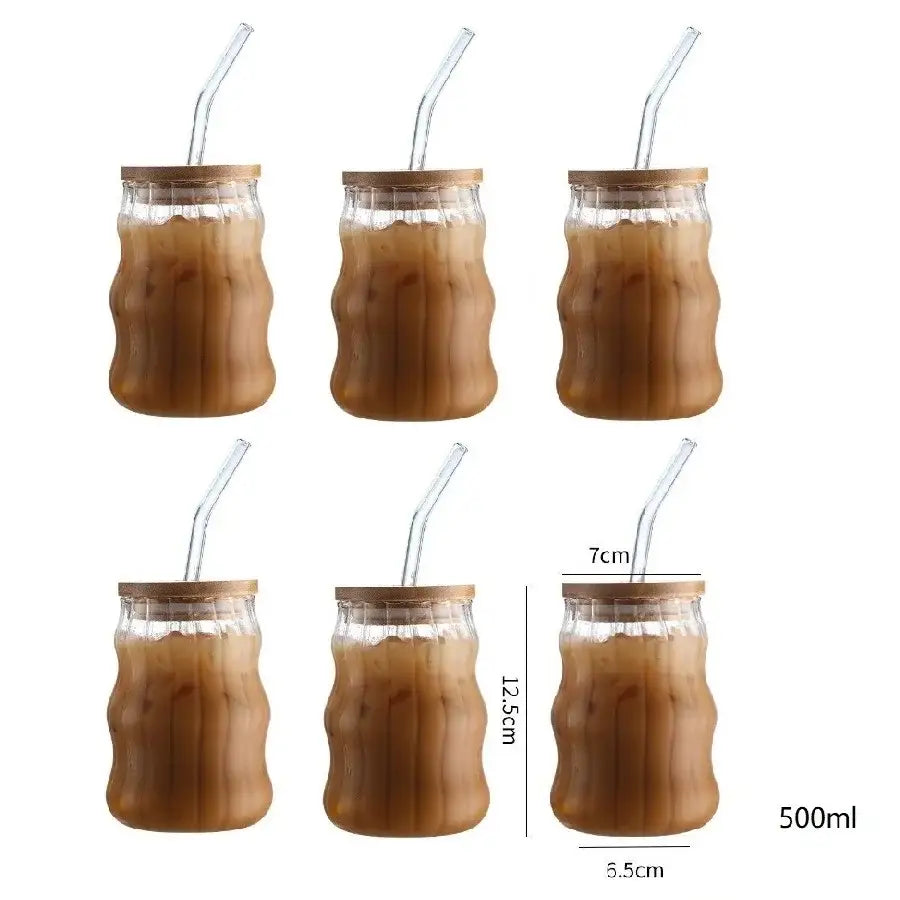 Ribbed glass cup set with bamboo lids and straws for dining room