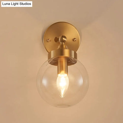 DecorBites™ Rotatable Bedroom Wall Lamp in Brass with Clear Glass and Modernist Ball Design