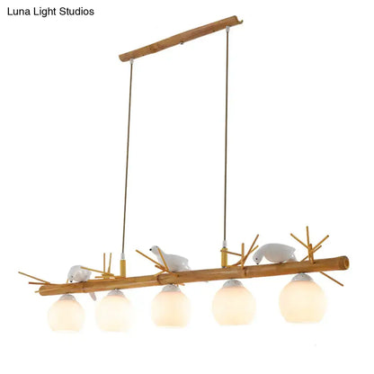 Rustic bamboo & white glass dome island light fixture dining room white bird deco