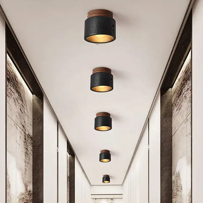 Rustic black travertine ceiling light for entrance hallway