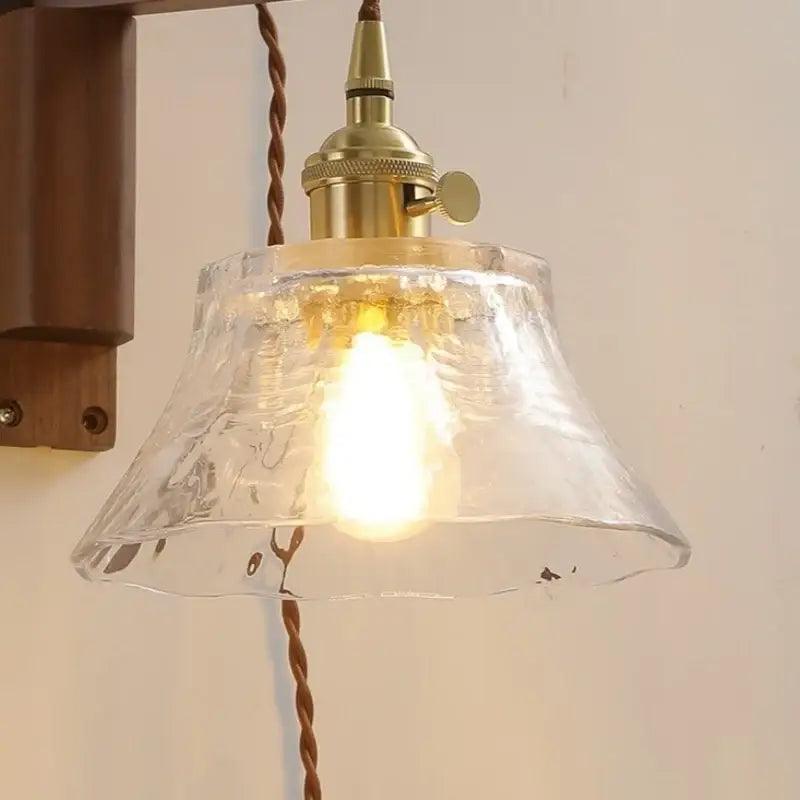 Rustic brass and clear glass wall sconce stair light fixture