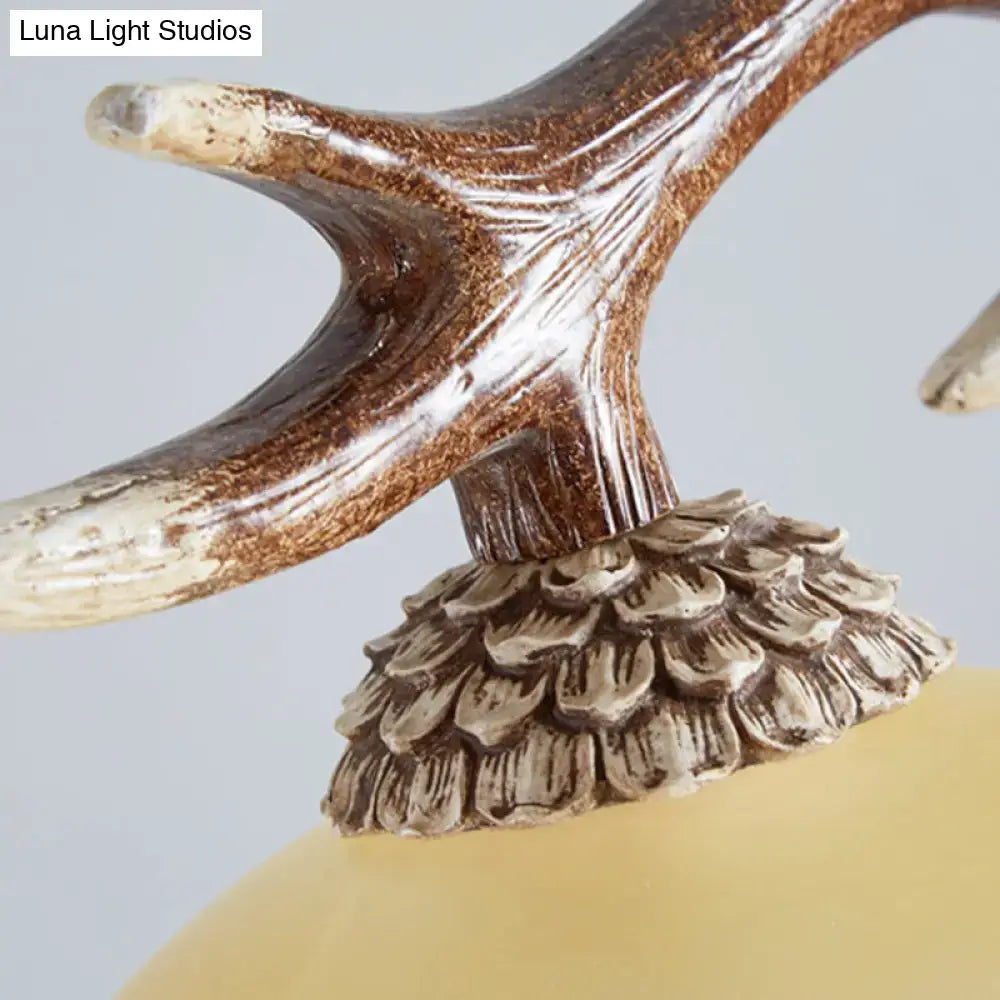 Rustic brown antler ceiling light with flaxen fabric shades bedroom