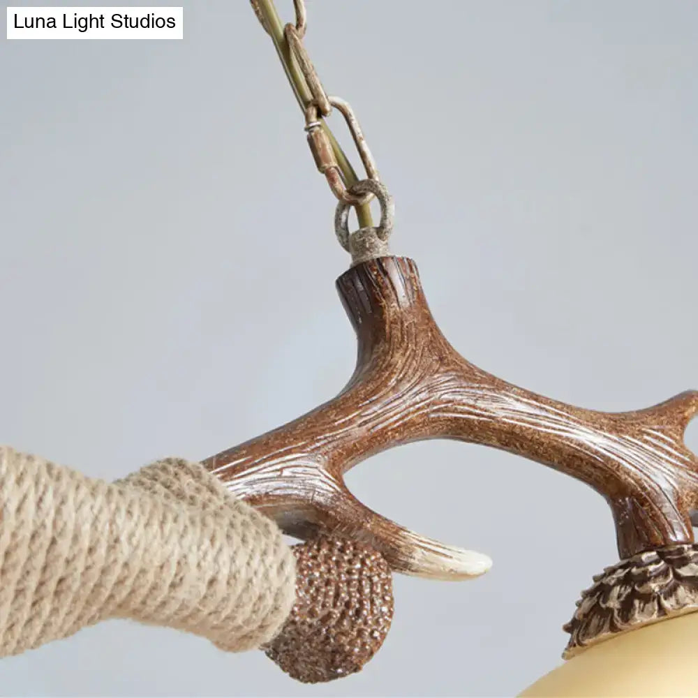 Rustic brown antler ceiling light with flaxen fabric shades bedroom