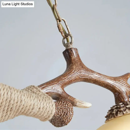 Rustic brown antler ceiling light with flaxen fabric shades bedroom