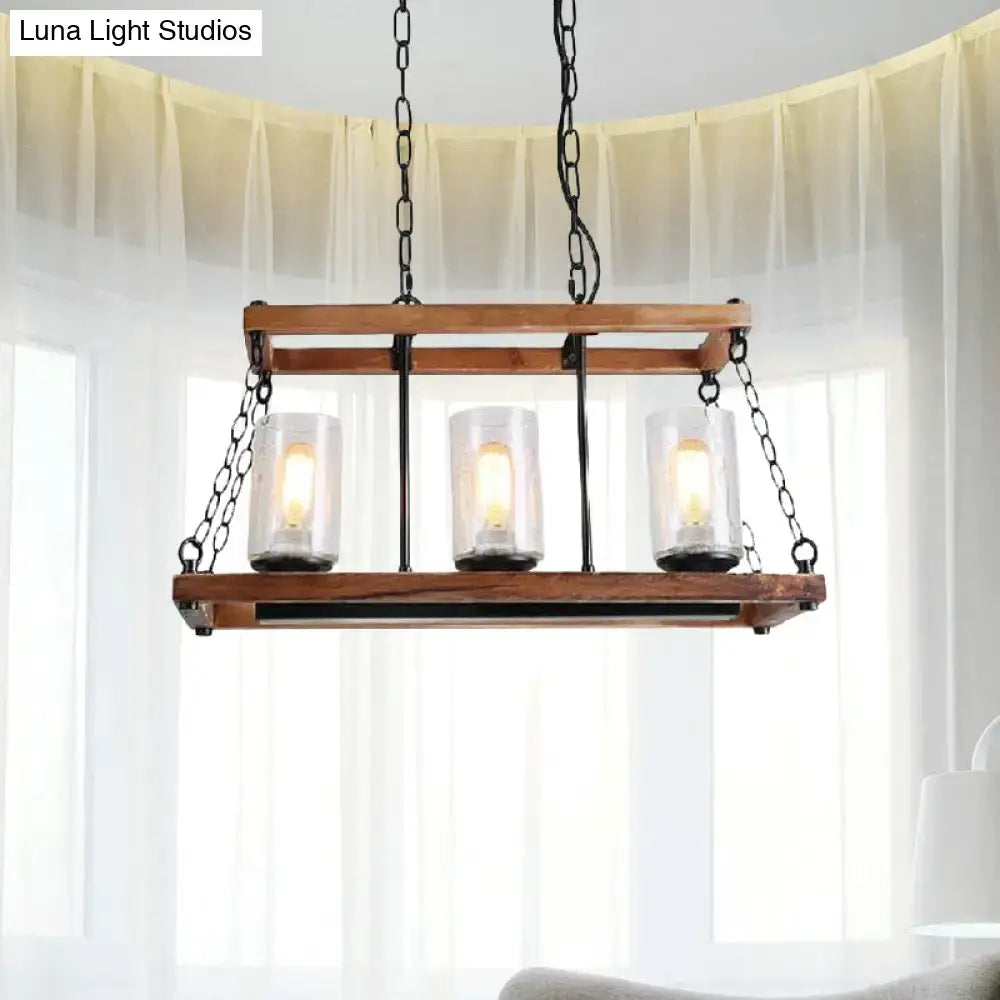 Rustic brown seeded glass island light with wooden trapezoid guard kitchen