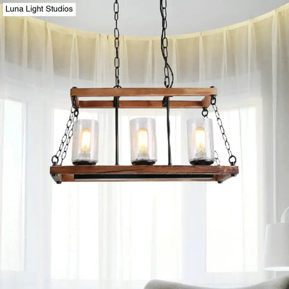 Rustic brown seeded glass island light with wooden trapezoid guard kitchen