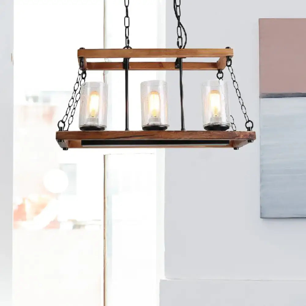 Rustic brown seeded glass island light with wooden trapezoid guard kitchen