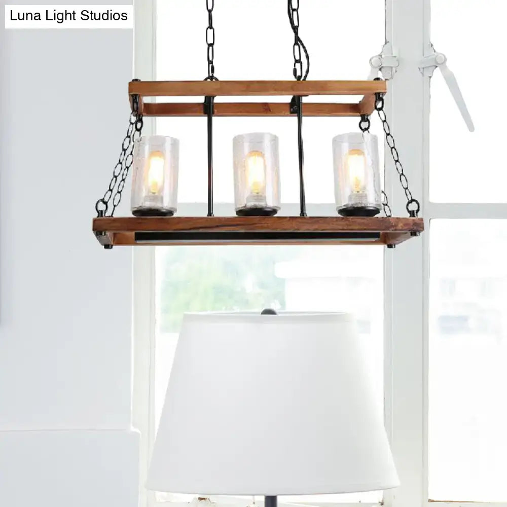 Rustic brown seeded glass island light with wooden trapezoid guard kitchen
