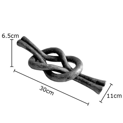 Rustic dark metal geometric knot resin sculpture living room artwork