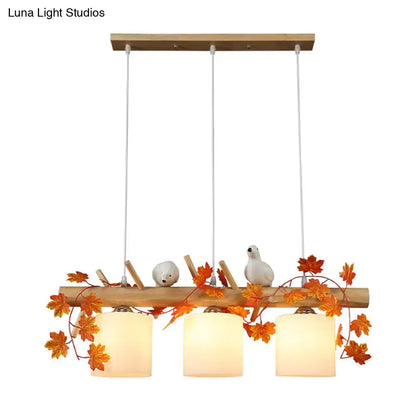 Rustic ivory glass wood island pendant – kitchen green leaf decor