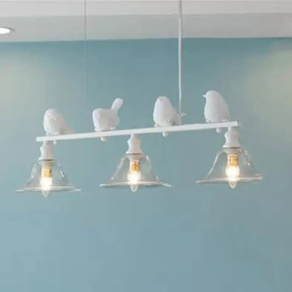 Rustic white bird island light kitchen fixture with clear glass
