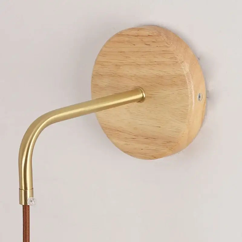 Rustic wood and brass wall light with clear glass pull chain switch