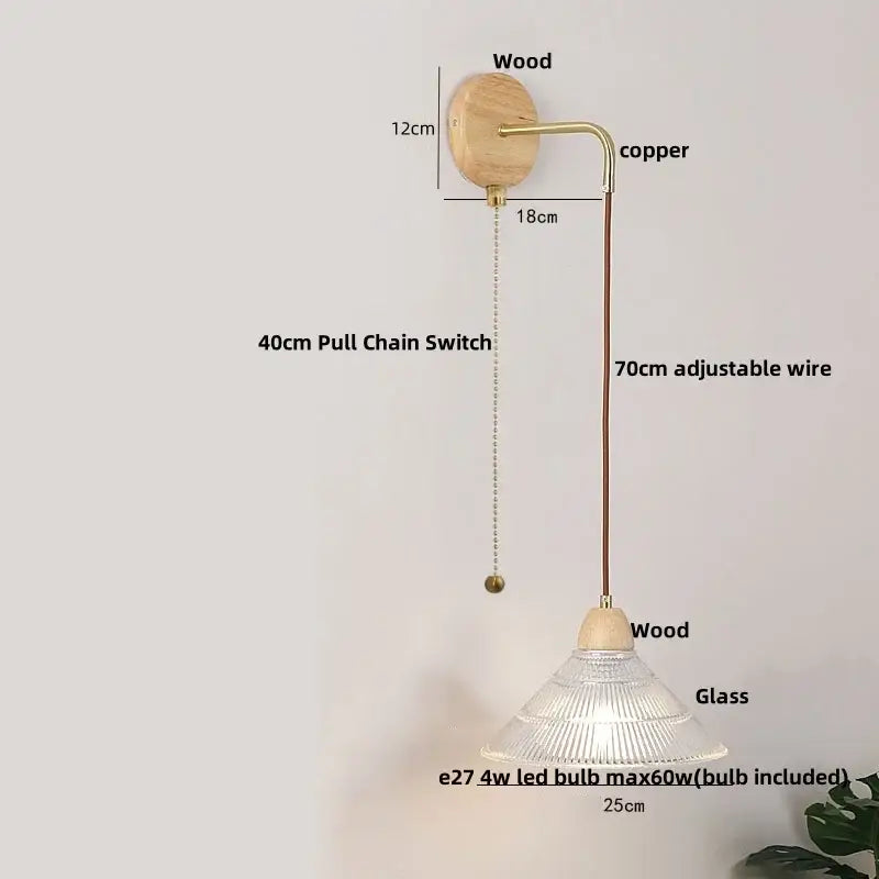Rustic wood and brass wall light with clear glass pull chain switch