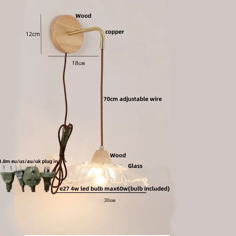 Rustic wood and brass wall light with clear glass pull chain switch