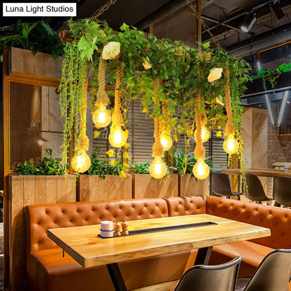Rustic wooden island light fixture with decorative vines dining room