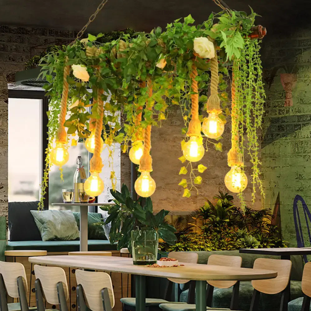 Rustic wooden island light fixture with decorative vines dining room