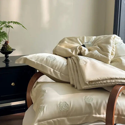 Satin cream eucalyptus fiber flower embroidery quilt set bedroom