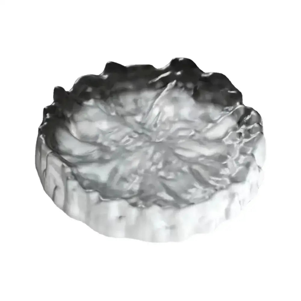 Scalloped crystal glass coaster and jewelry display panel dining room