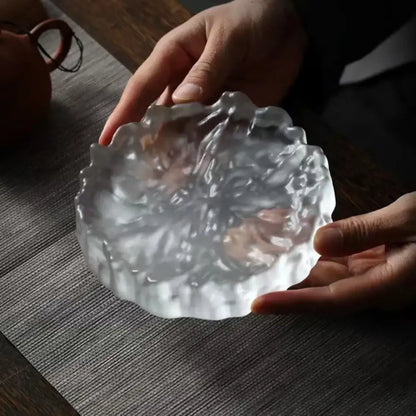 Scalloped crystal glass coaster and jewelry display panel dining room