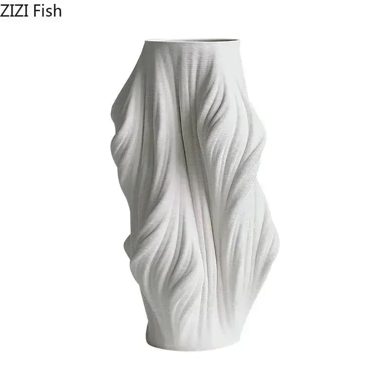 Sculpted white ceramic vase set with purple flowers for bedroom decor