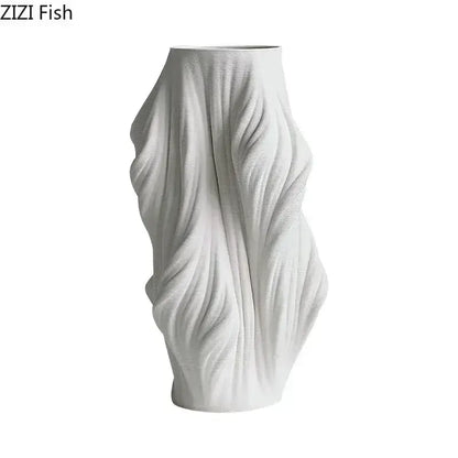 Sculpted white ceramic vase set with purple flowers for bedroom decor