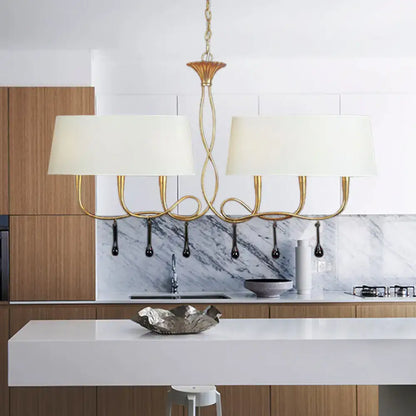 Silver twisted metal island chandelier with dark brown dining room shades
