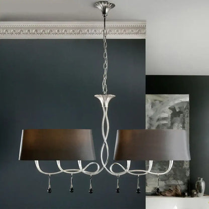 Silver twisted metal island chandelier with dark brown dining room shades