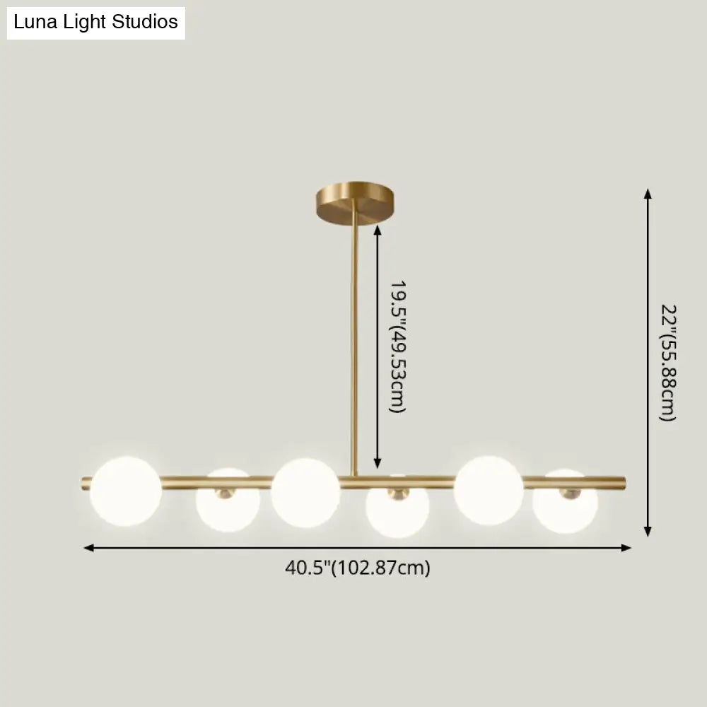 DecorBites™ Sleek and Elegant Linear Gold Island Pendant Lighting with Spherical Glass Shades for Dining Table