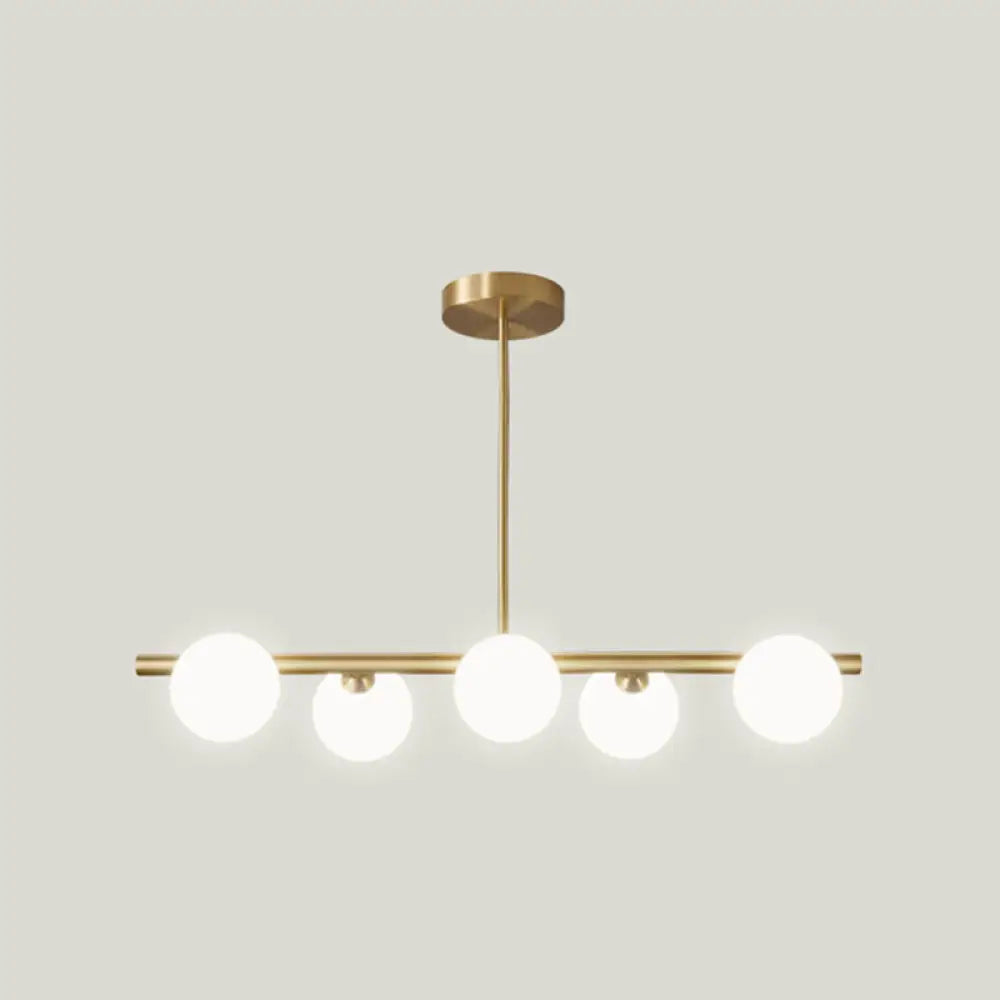 DecorBites™ Sleek and Elegant Linear Gold Island Pendant Lighting with Spherical Glass Shades for Dining Table