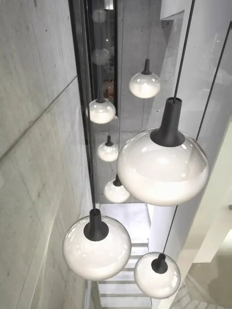 Sleek black and frosted glass cob led chandelier dining room lighting