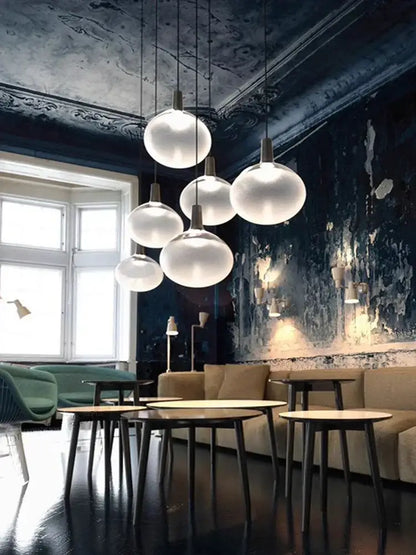 Sleek black and frosted glass cob led chandelier dining room lighting