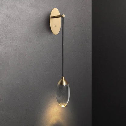 Sleek brass and crystal led wall light for bedroom living room