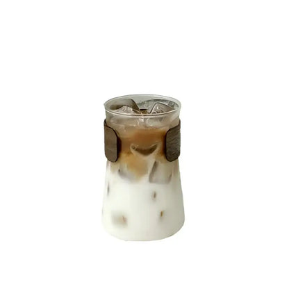 Sleek glass iced latte coffee cup with wood band kitchen tumbler
