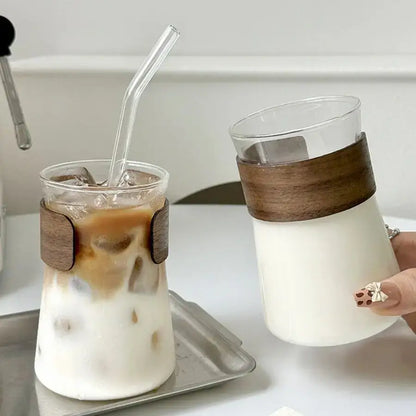 Sleek glass iced latte coffee cup with wood band kitchen tumbler