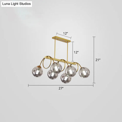DecorBites™ Sleek Gold Spiral Island Light - Post-Modern Metal Ceiling Hang Lamp with Ball Glass Shade