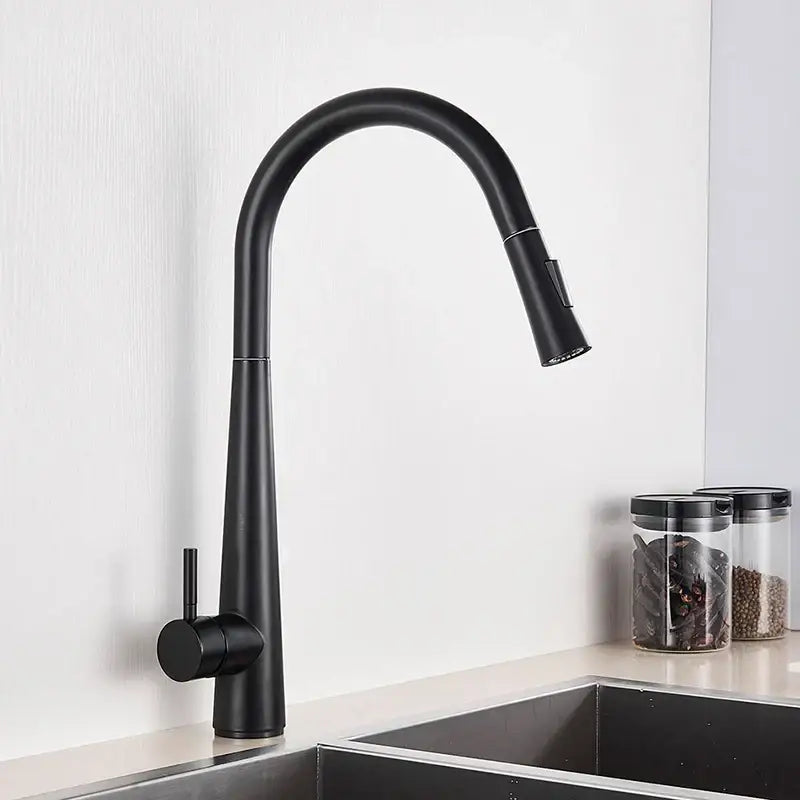 Sleek gold swivel kitchen faucet with pull down sprayer