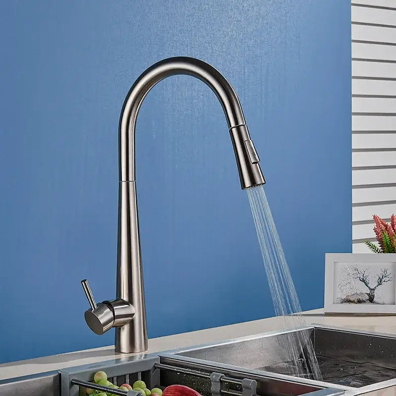 Sleek gold swivel kitchen faucet with pull down sprayer