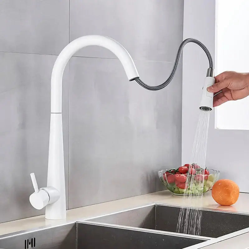 Sleek gold swivel kitchen faucet with pull down sprayer
