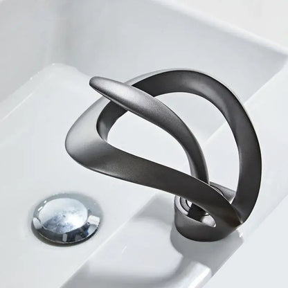 Sleek matte black brass waterfall basin faucet for bathroom