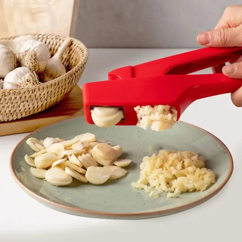 Sleek red manual press garlic crusher kitchen grinder